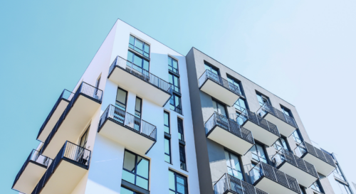 Modernes Mehrparteienhaus visualisierend für: Die vermietete Immobilie: Steuertipps kennen und nutzen!