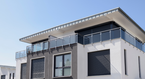 Moderne Wohnhäuser visualisierend für Immobilienverkauf: Unentgeltliche Ratenzahlungsvereinbarung führt nicht mehr zu Kapitalerträgen